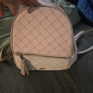 Elegant Pink Backpack with Gold Accents
